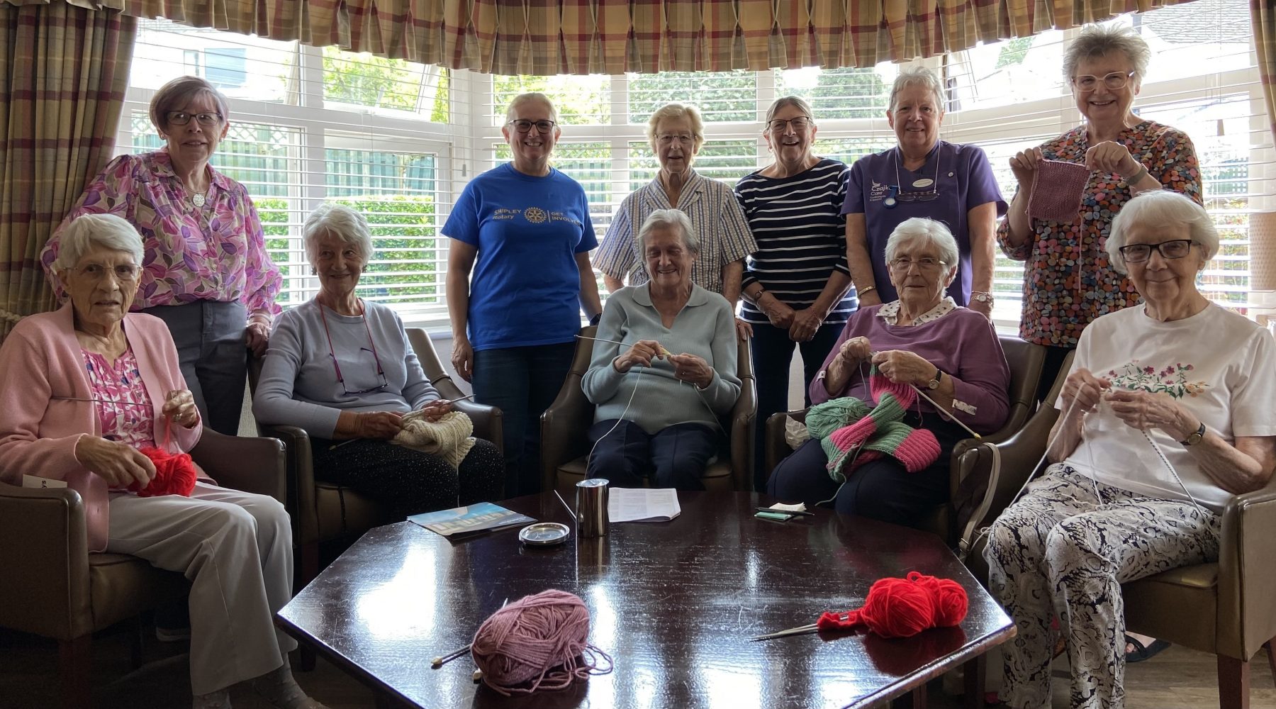 ﻿Local ladies knit next cargo of aid together…