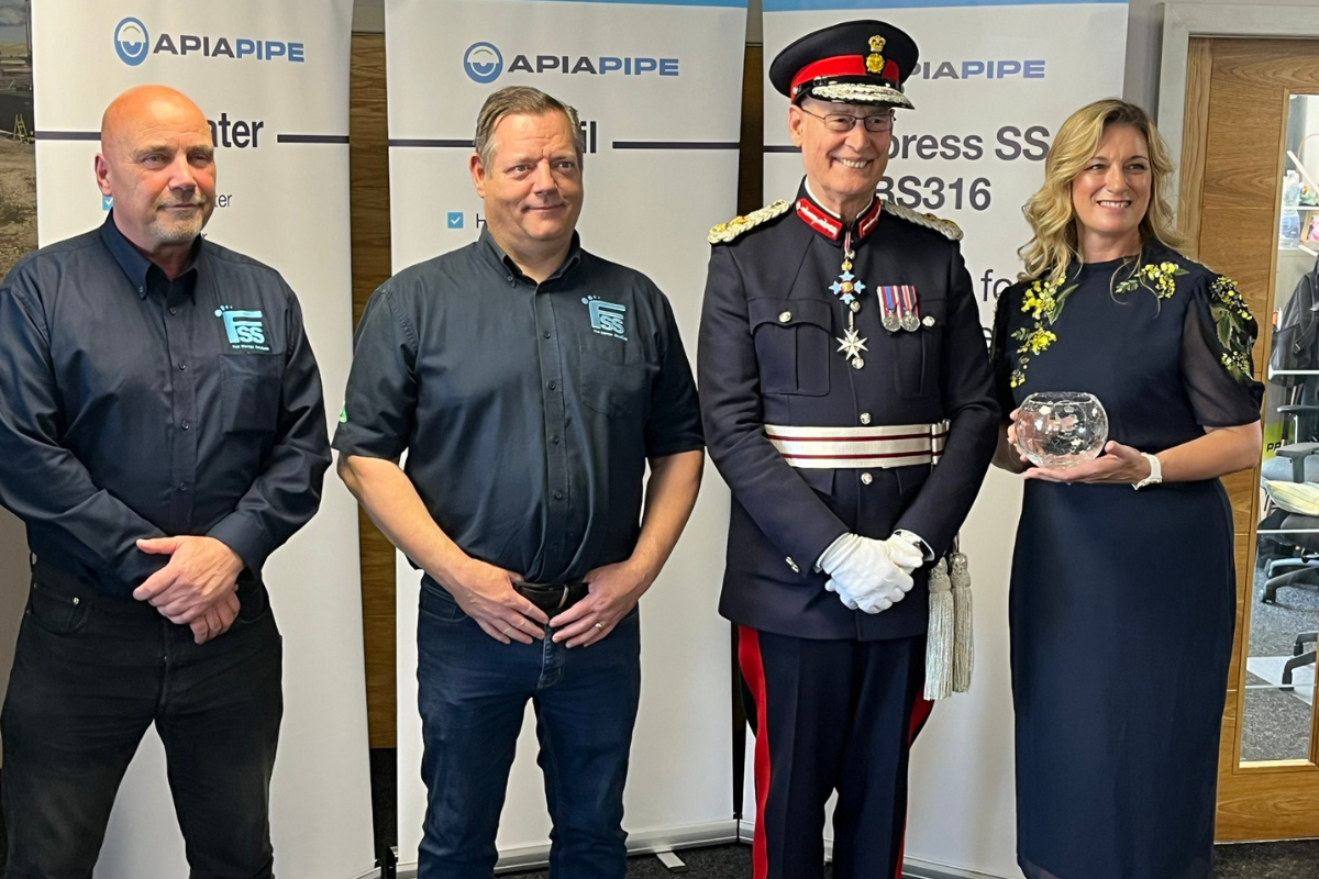 Pipe-in-a-pipe award presentation for recipients of royal accolade