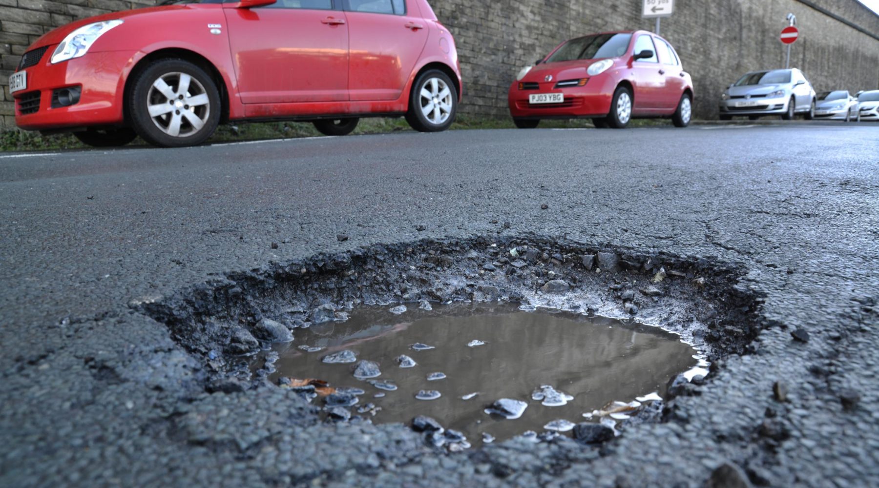 Bradford Council spent over £630,000 fixing potholes as…