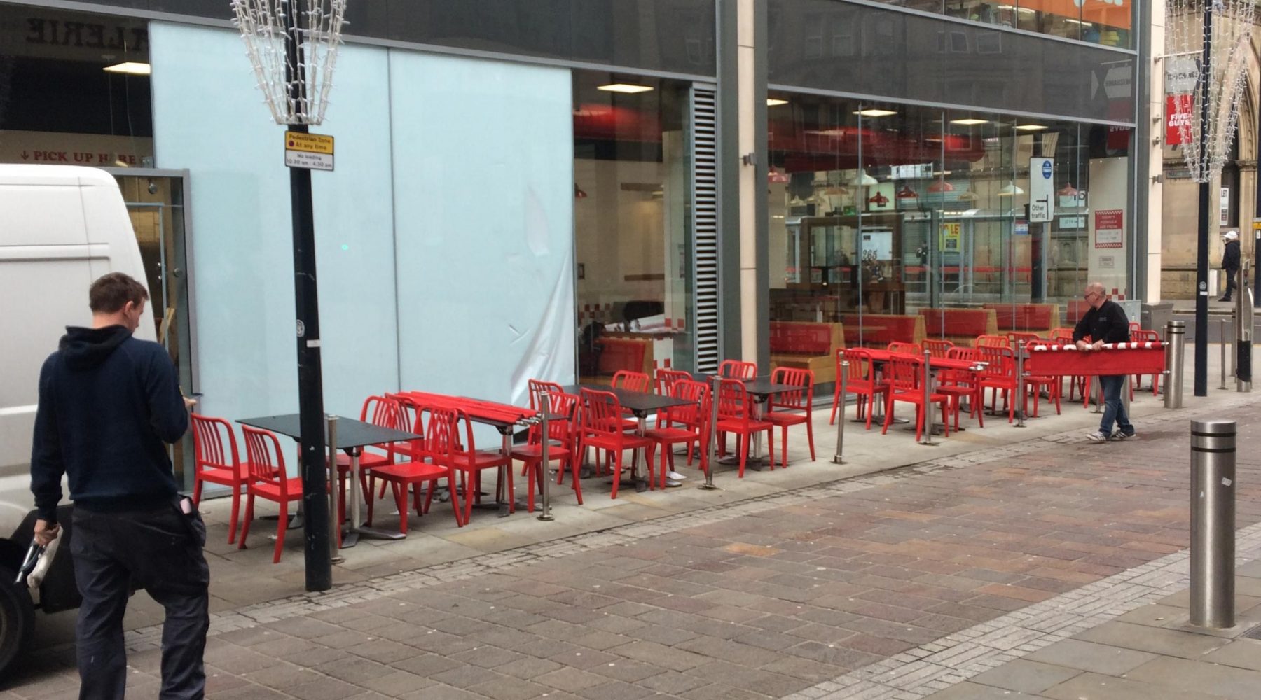 Workers clear fittings from Bradford Five Guys